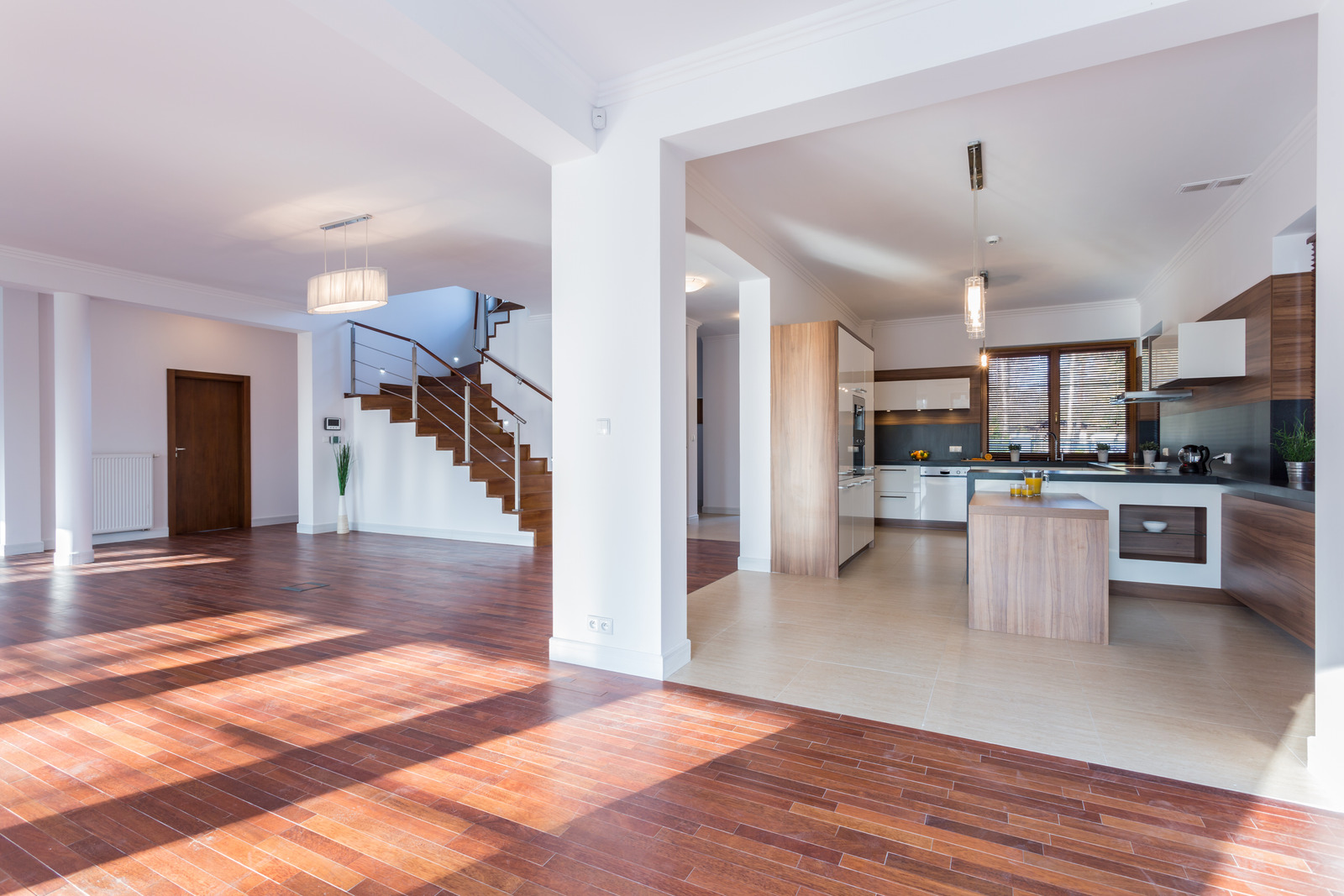 Contemporary open kitchen merging with the living room